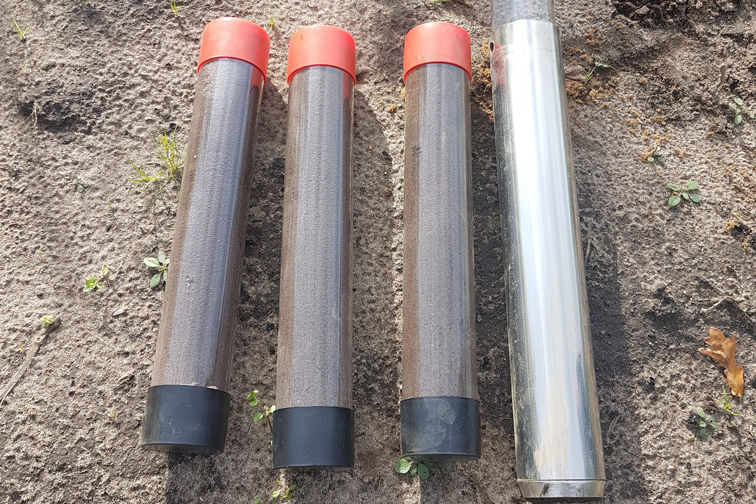 soil samples in plastic tubes, metal core barrel